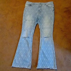 Ripped butterfly flare jeans